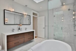Bathroom remodel with walk-in shower and modern finishes in Raleigh NC