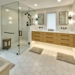 Standard bathroom remodel with frameless glass shower and quartz vanity